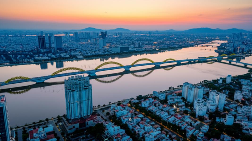 ✈️ Săn Vé Máy Bay Đi Đà Nẵng Giá Rẻ Nhất 2024 - Ưu Đãi HOT! 3 Da Nang sunset aerial view showcases city